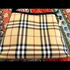 Authentic Burberry shoulder bag with dust cover.